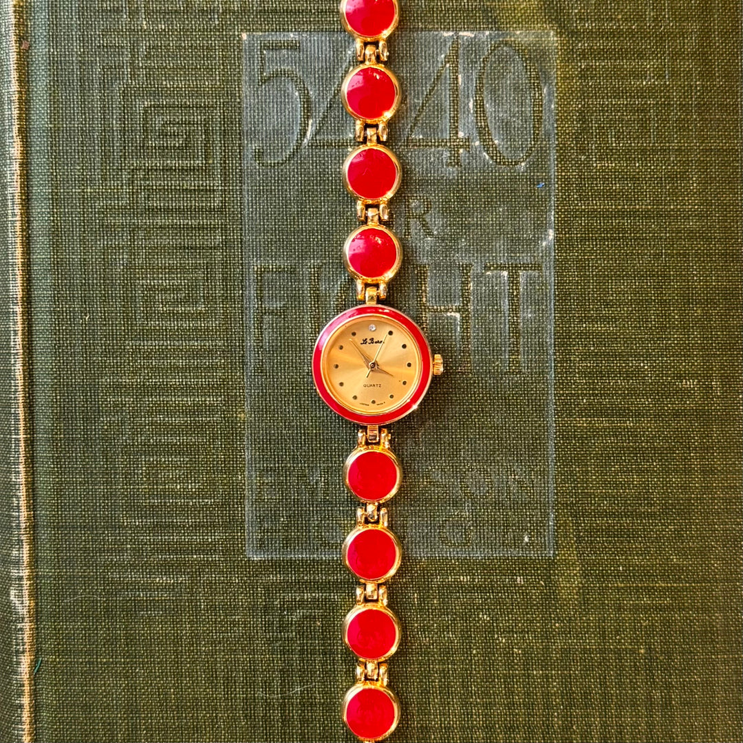 Gold Watch with Red Accents