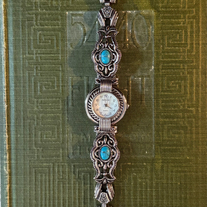 Silver Ornate Watch with Blue Stones