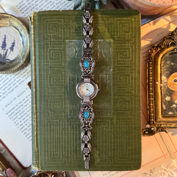 Silver Ornate Watch with Blue Stones