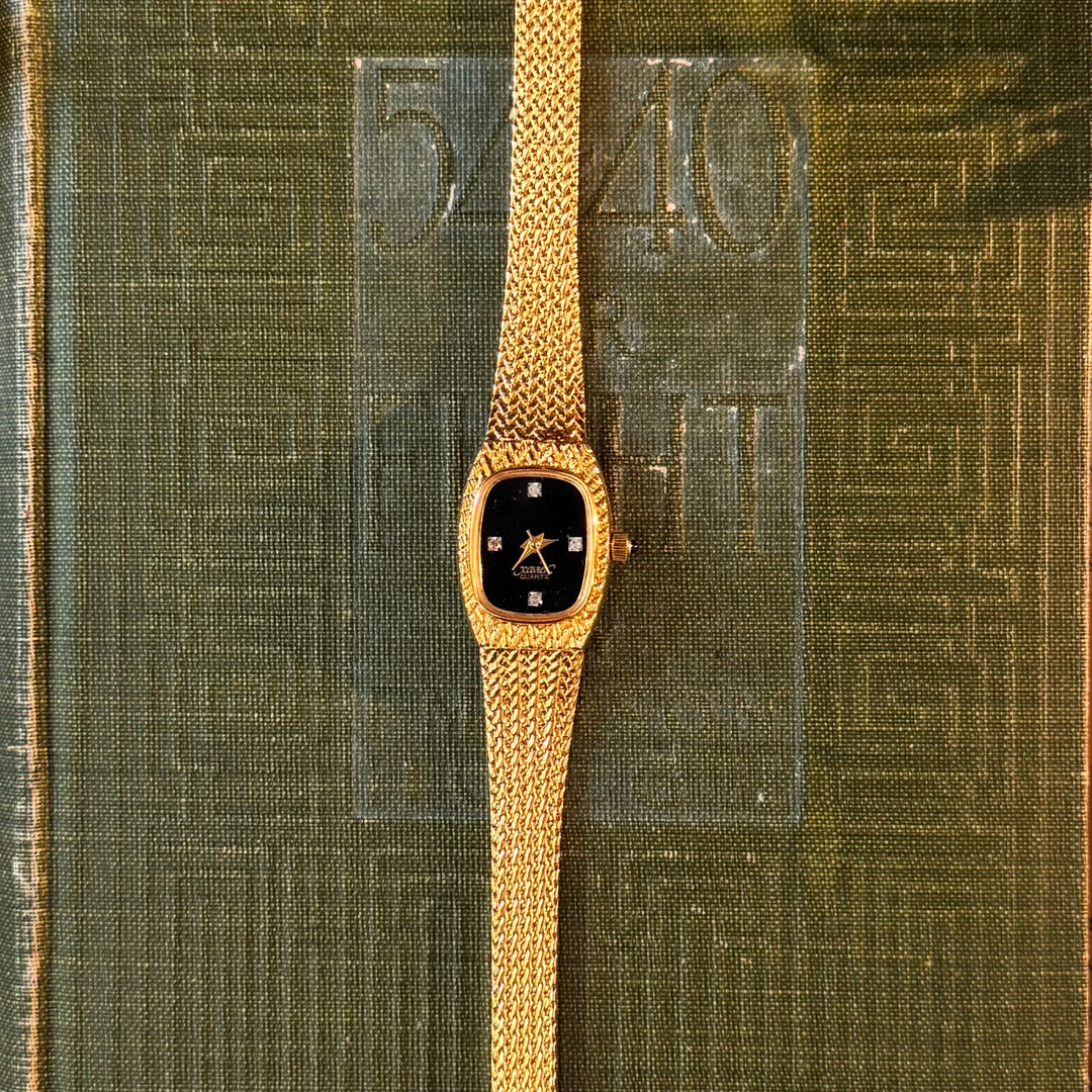Gold Watch with Black Face