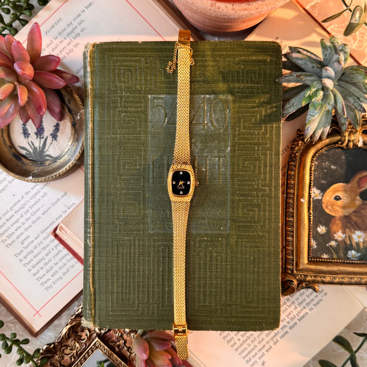 Gold Watch with Black Face