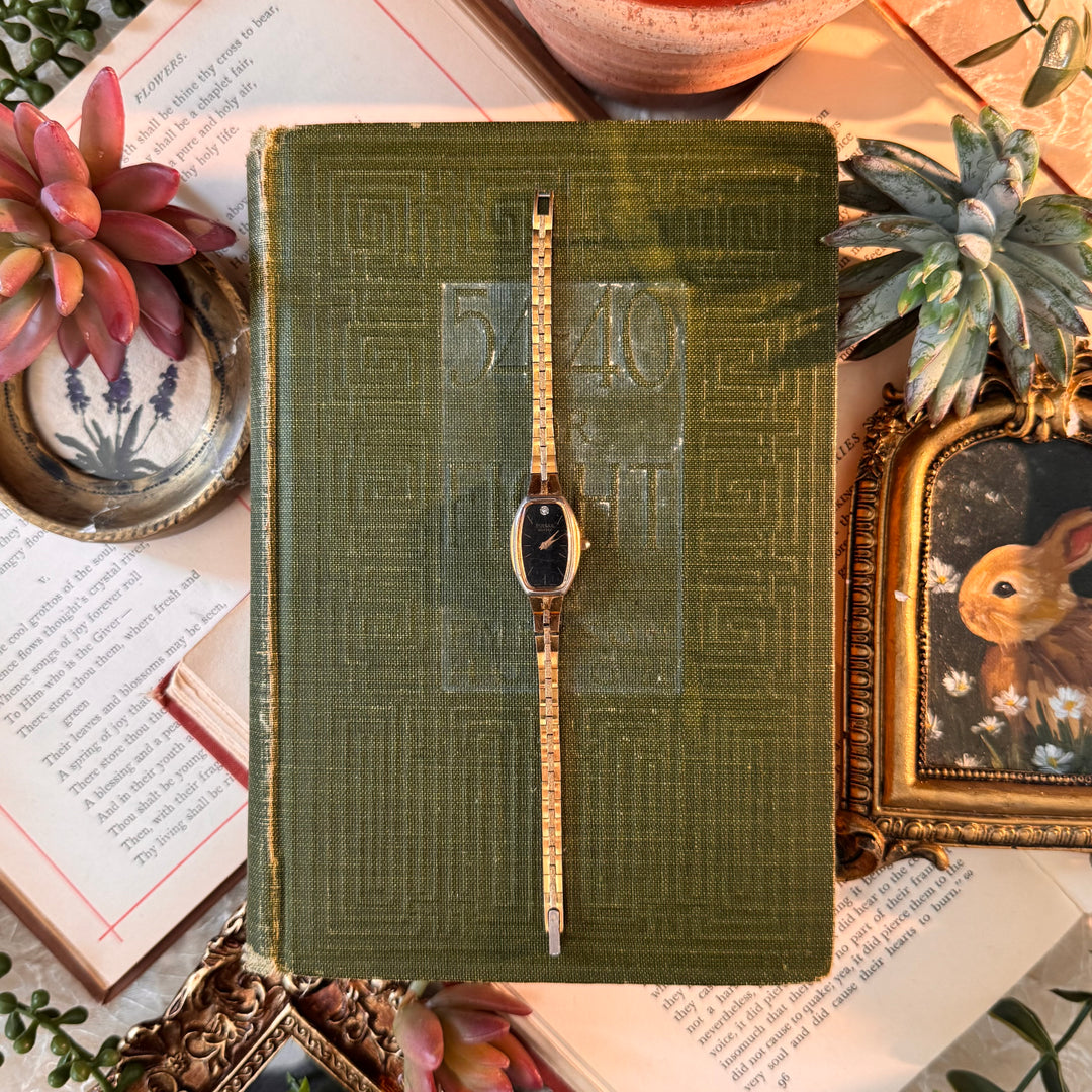 Gold Watch with Black Face