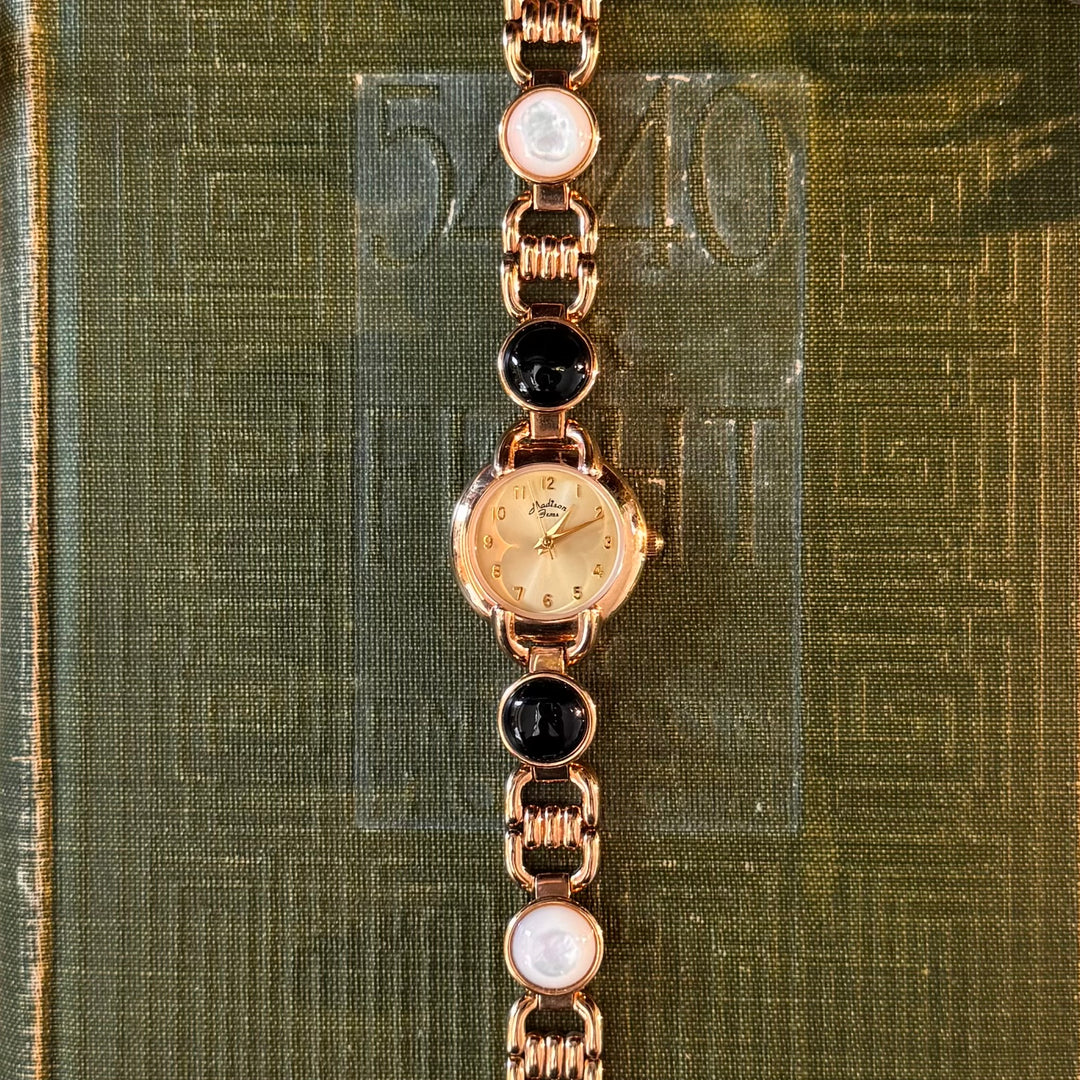 Gold Watch with Black & White Accents