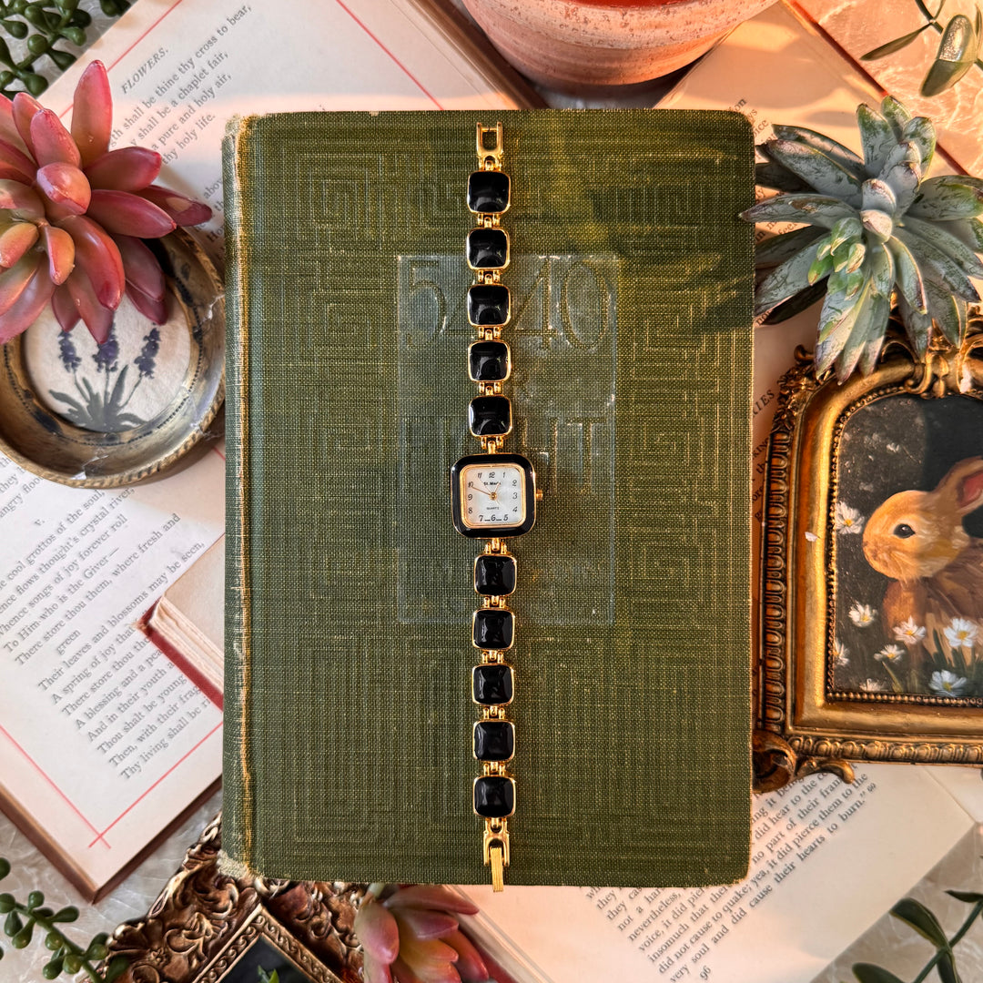 Gold Watch with Black Accents