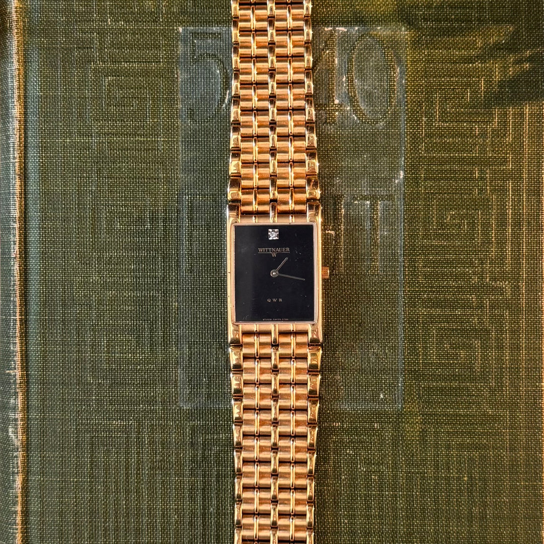 Gold Watch with Black Face