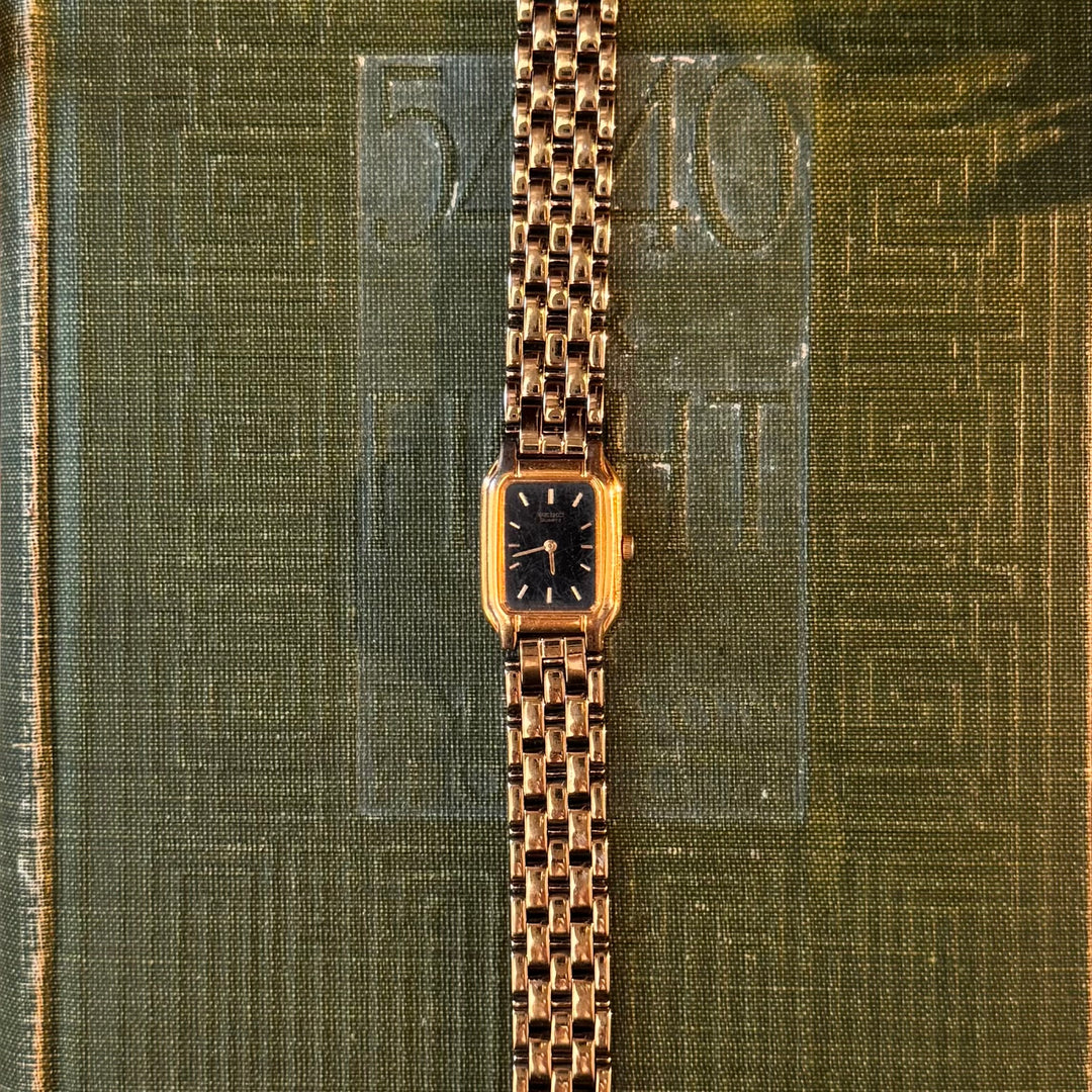 Gold Watch with Black Face