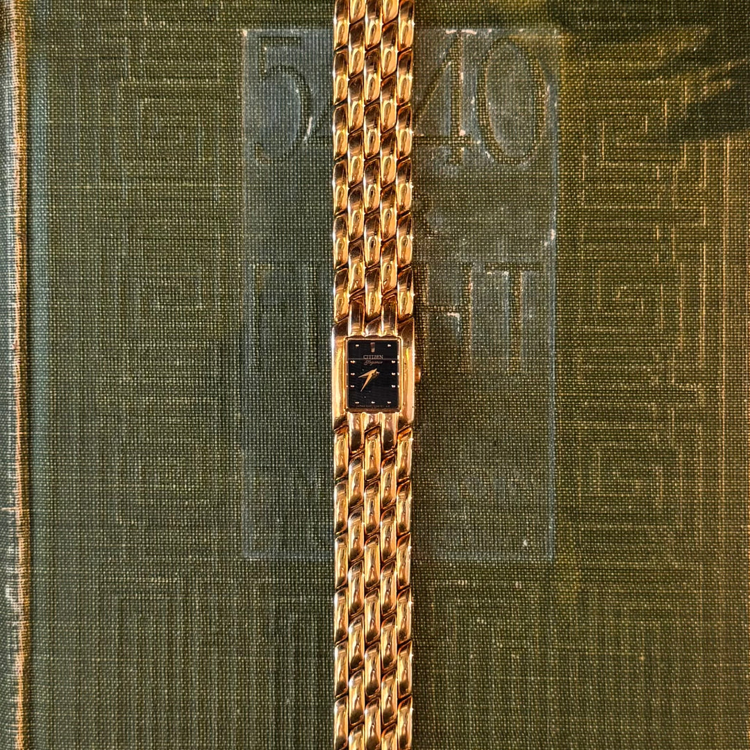 Gold Watch with Black Face