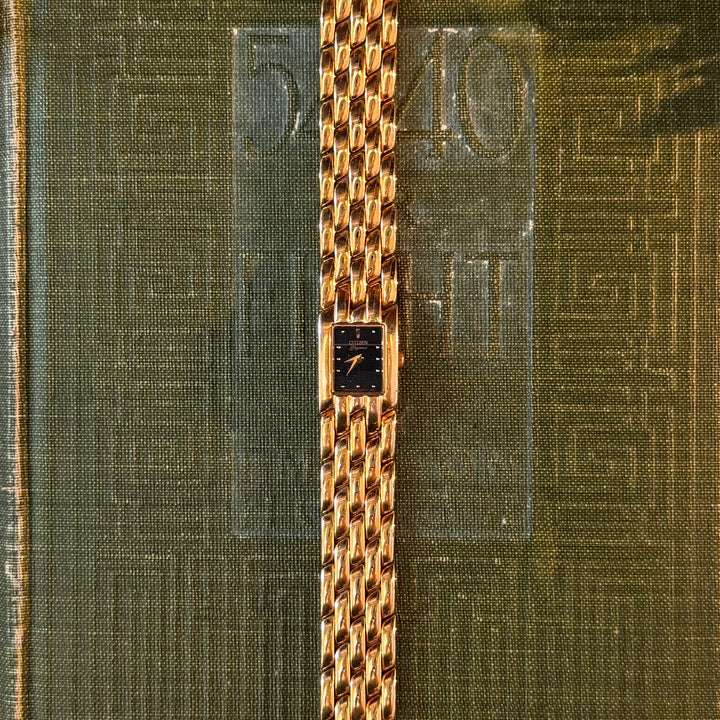 Gold Watch with Black Face