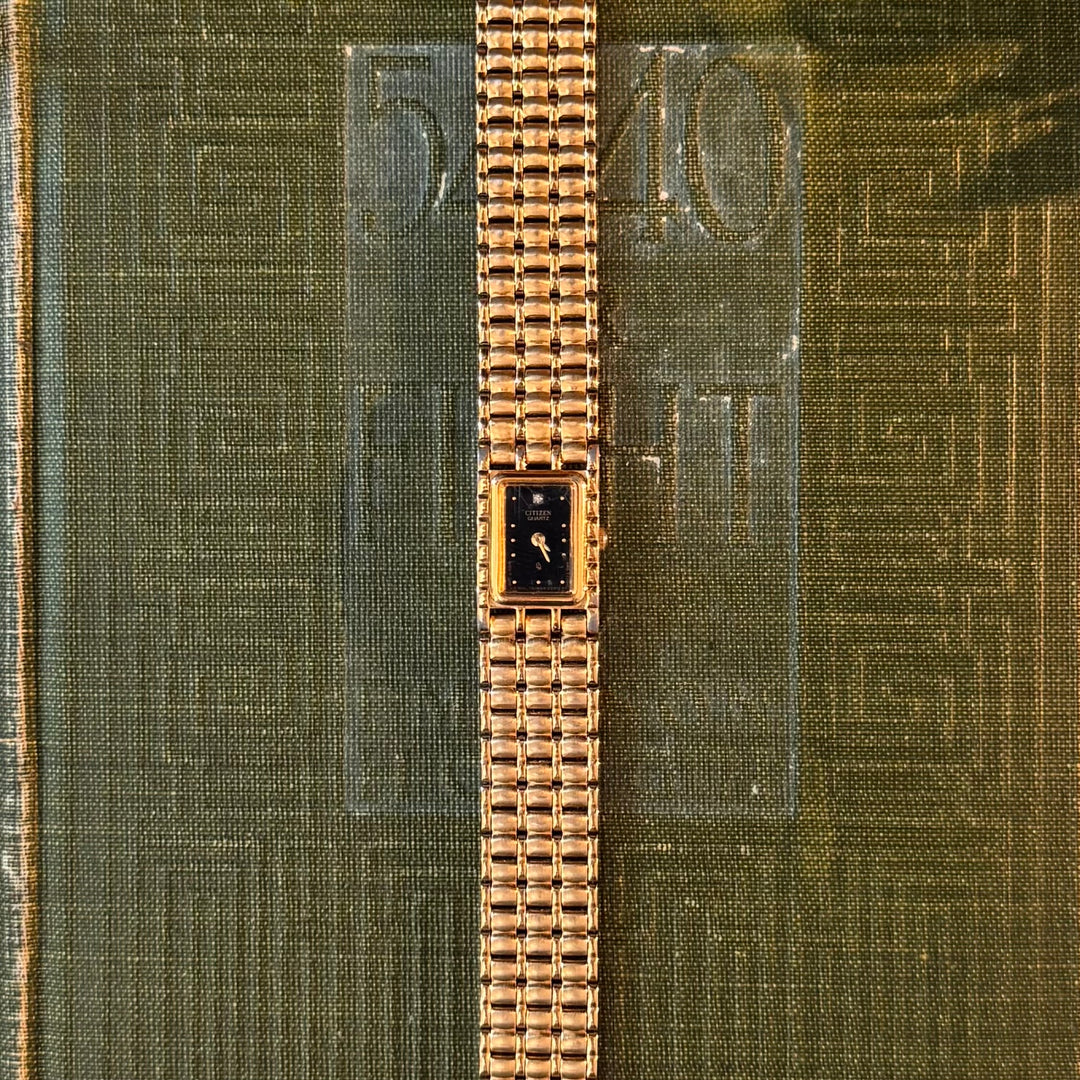 Gold Watch with Black Face