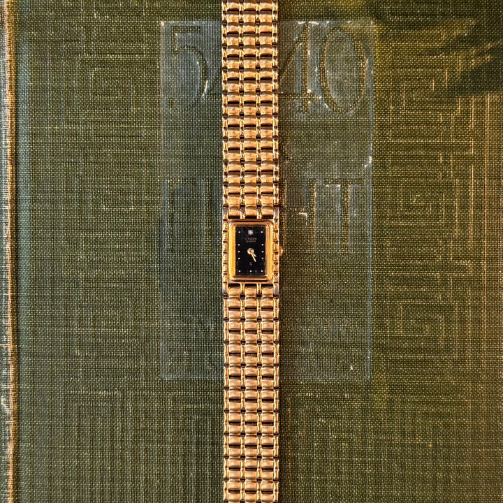 Gold Watch with Black Face