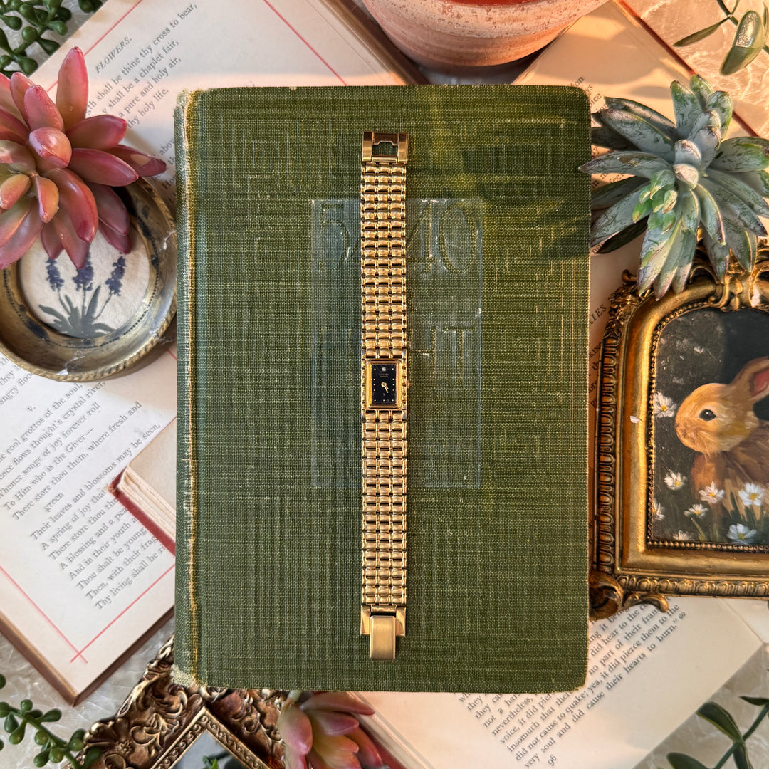 Gold Watch with Black Face