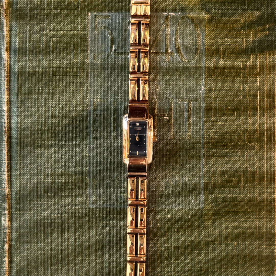 Gold Watch with Black Face