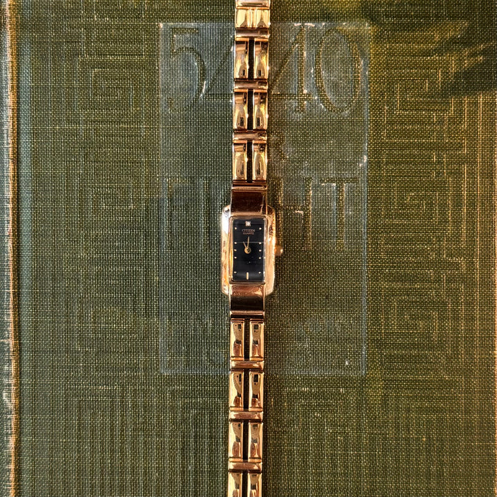 Gold Watch with Black Face