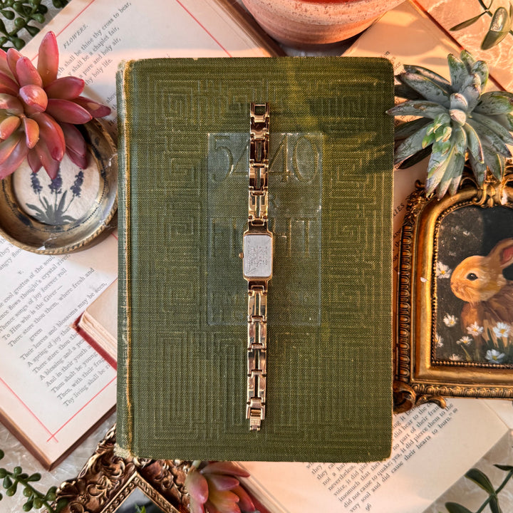 Gold Watch with Black Face