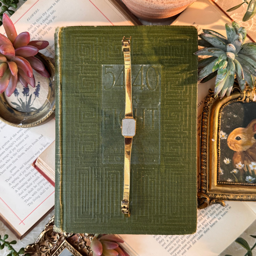 Gold Watch with Black Face