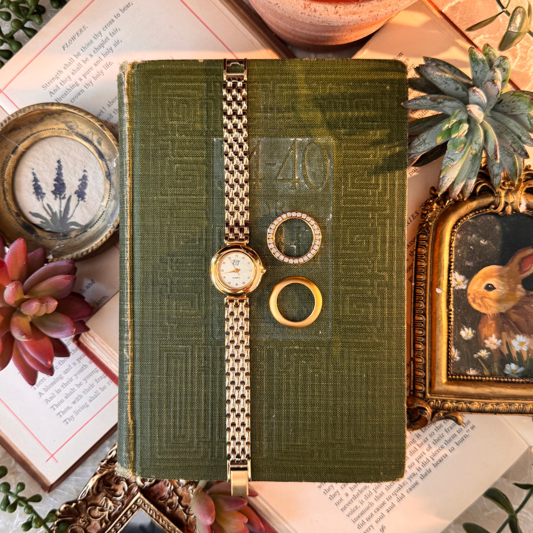 Gold Watch with Interchangeable Bezels