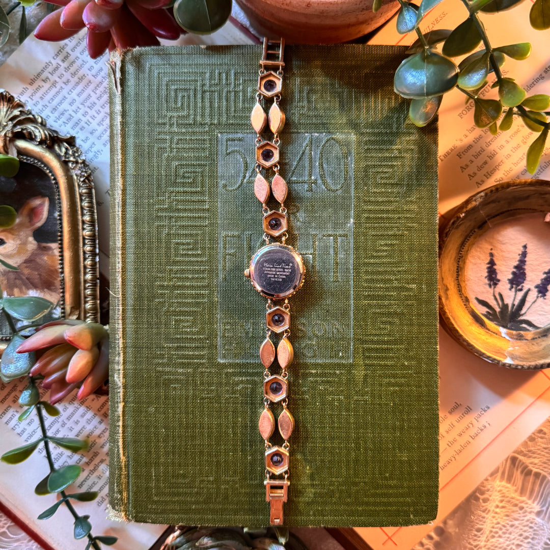 Gold Watch with Purple Stones
