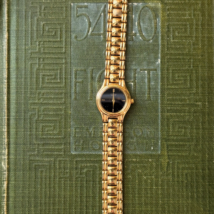 Gold Watch with Black Face