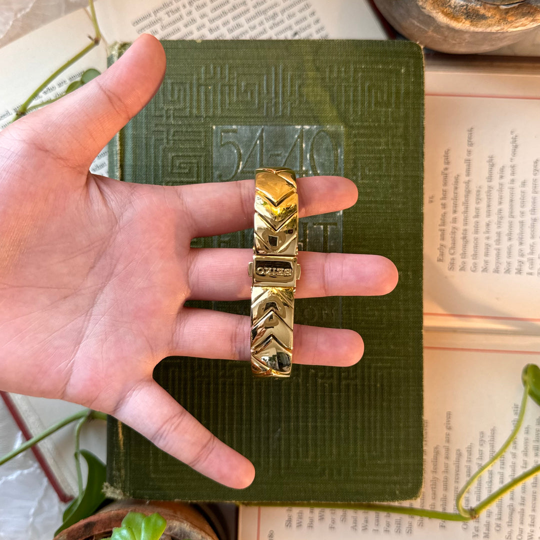 Gold Seiko Watch with Brown Face