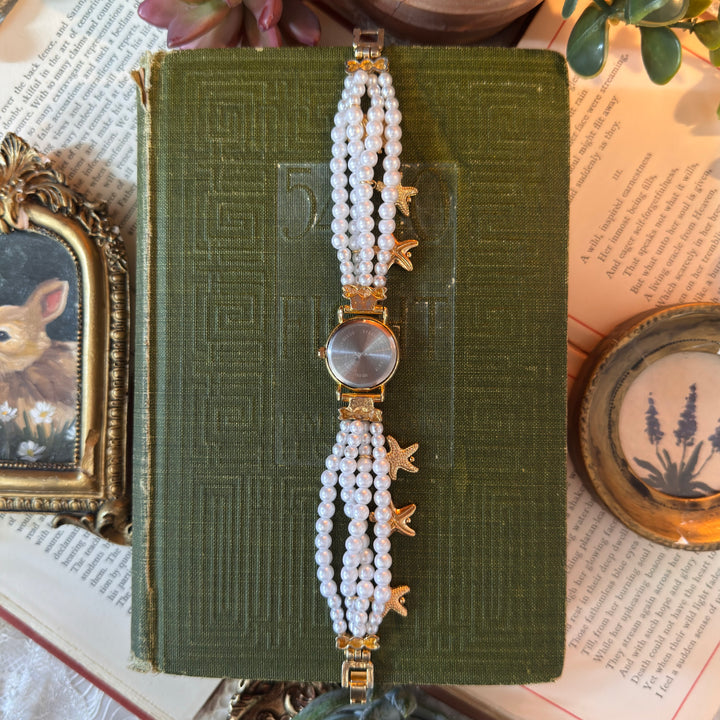Gold Pearl String Watch with Starfish Charms