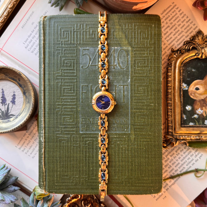 Gold Rare Nolan Miller Watch with Blue Cabochon Watch