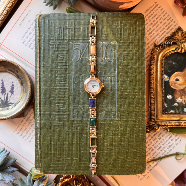 Gold Watch with Multicolored Stones