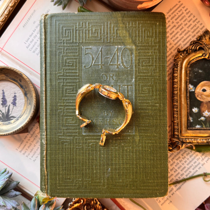 Gold Dolphin and Heart Watch