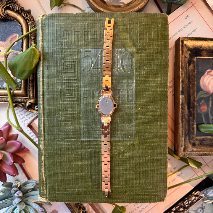 Gold Watch with Multicolored Stones