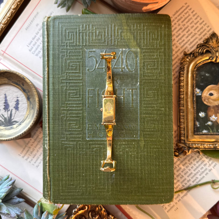 Genuine Gold Gucci Watch with Mother of Pearl Face