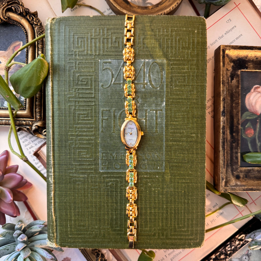 Gold Watch with Green Stones