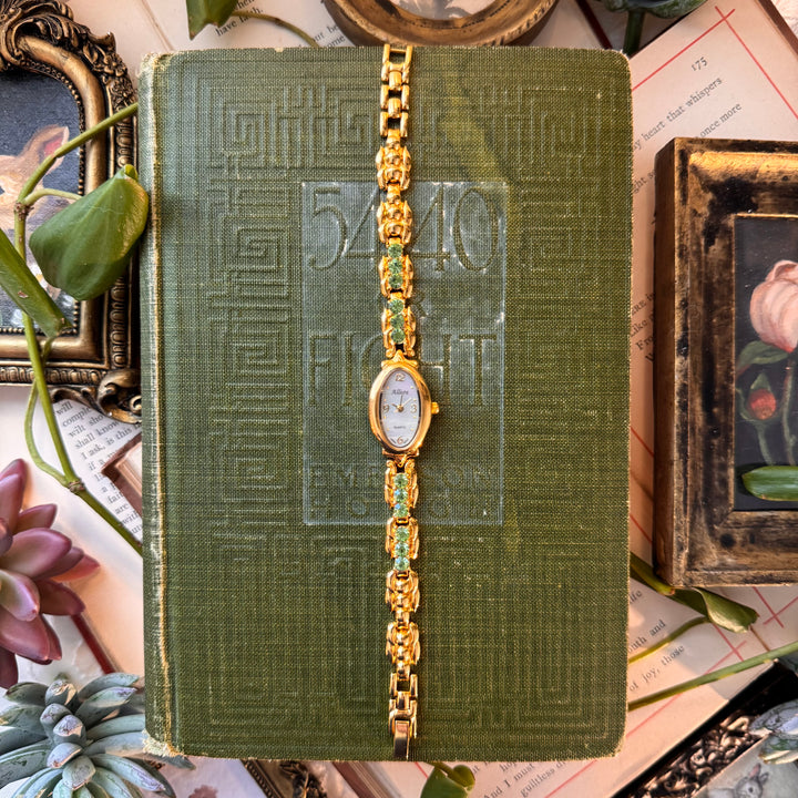 Gold Watch with Green Stones