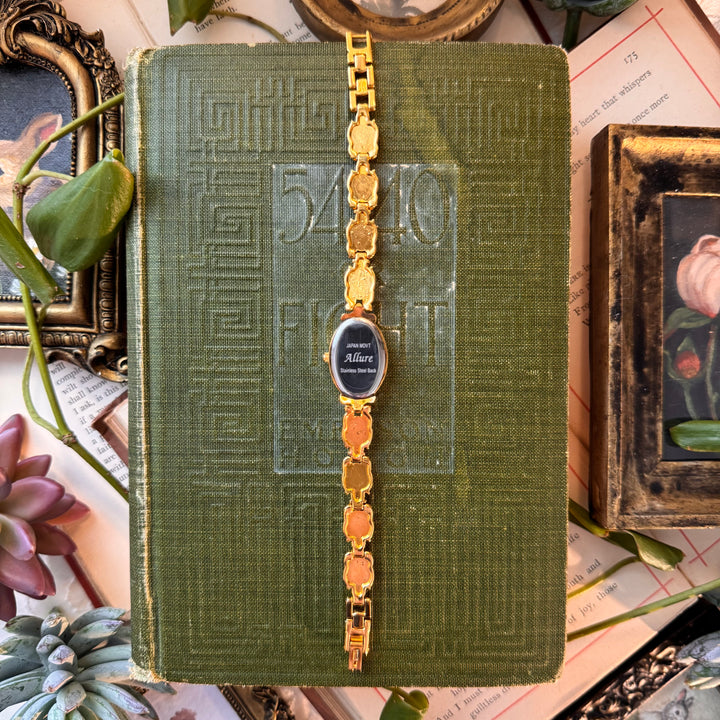 Gold Watch with Green Stones