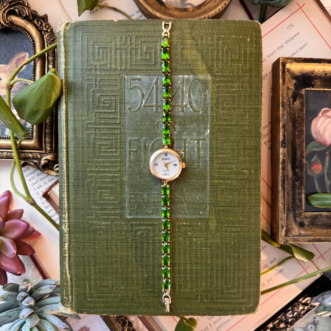 Gold Watch with Green Stones