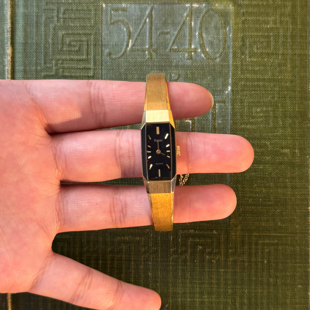 Gold Watch with Black Face