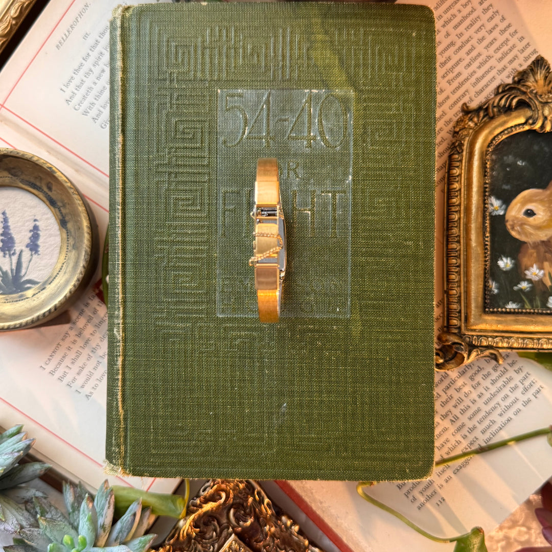 Gold Watch with Black Face