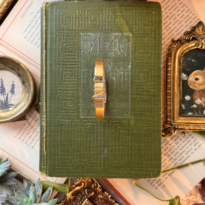Gold Watch with Black Face
