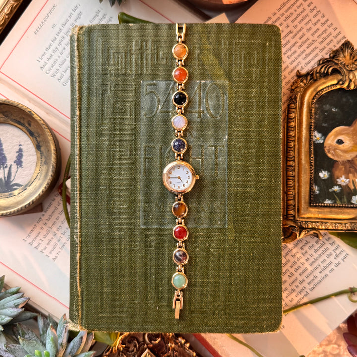 Gold Watch with Multicolored Stones