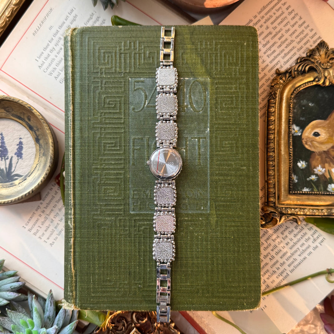 Silver Watch with Green Accents