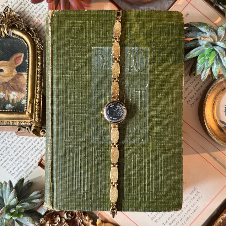 Gold Watch with Off While Accents