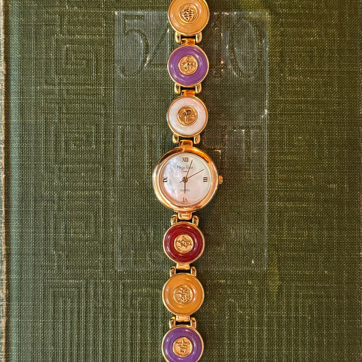 Gold Watches with Cabochon Stones