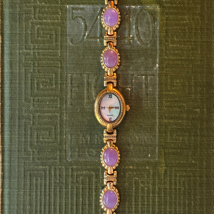 Gold Watch with Purple Cabochon Stones