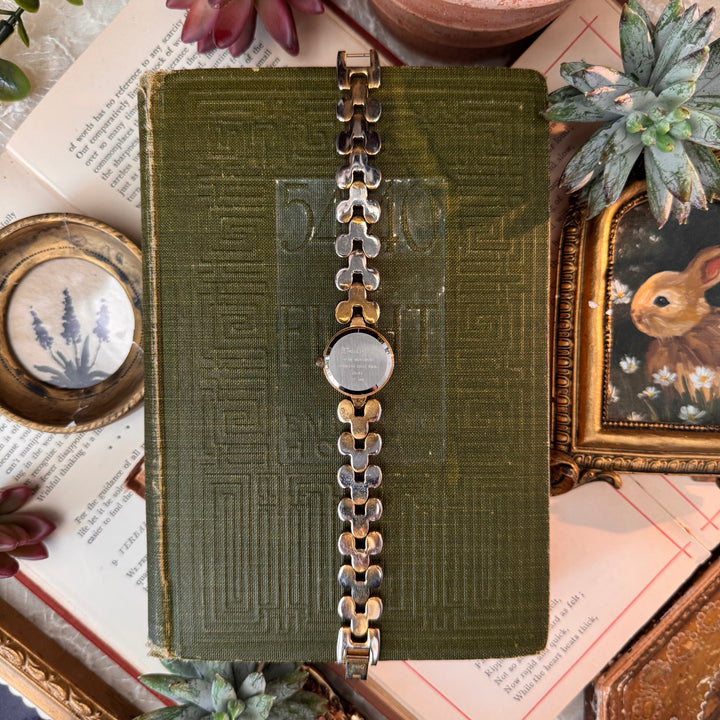 Gold Watch with Purple Stones