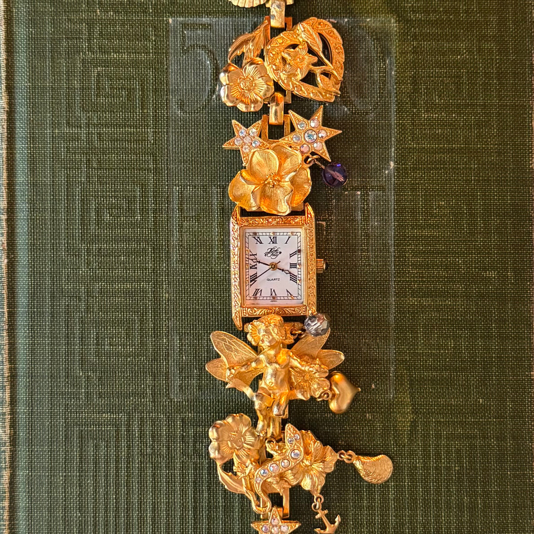 Extremely Rare Kirks Folly Cherub Charm Watch