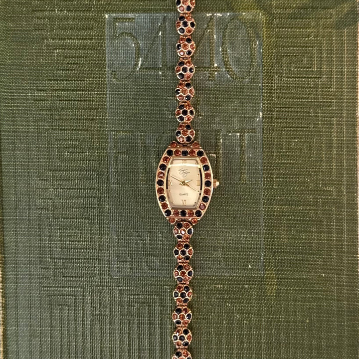 Gold Watch with Multicolored Stones
