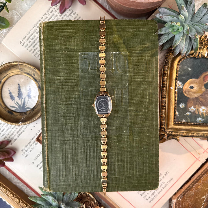 Gold Watch with Multicolored Stones