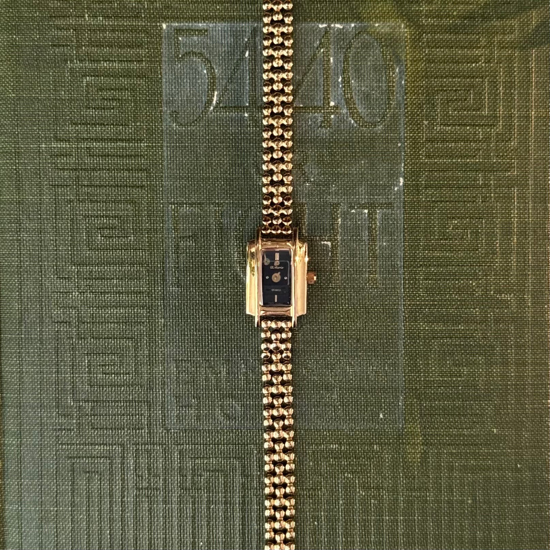 Gold Watch with Black Face