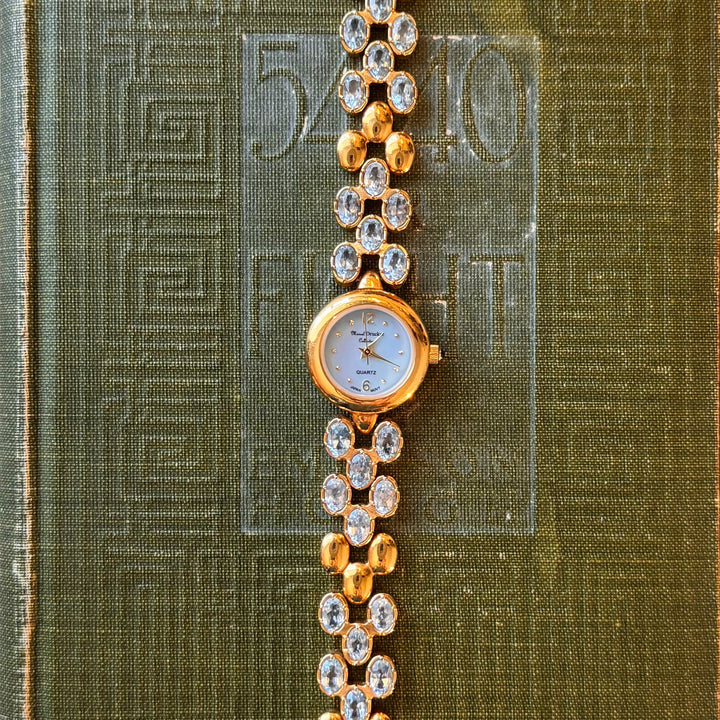 Gold Marcel Drucker Watch with Blue Gemstones