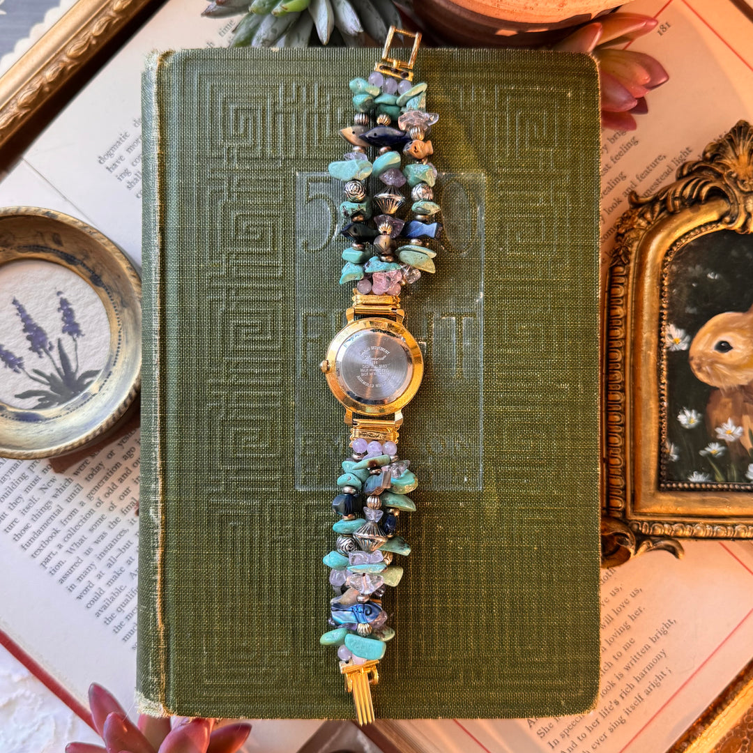 Gold Beaded Watch with Mother of Pearl Face