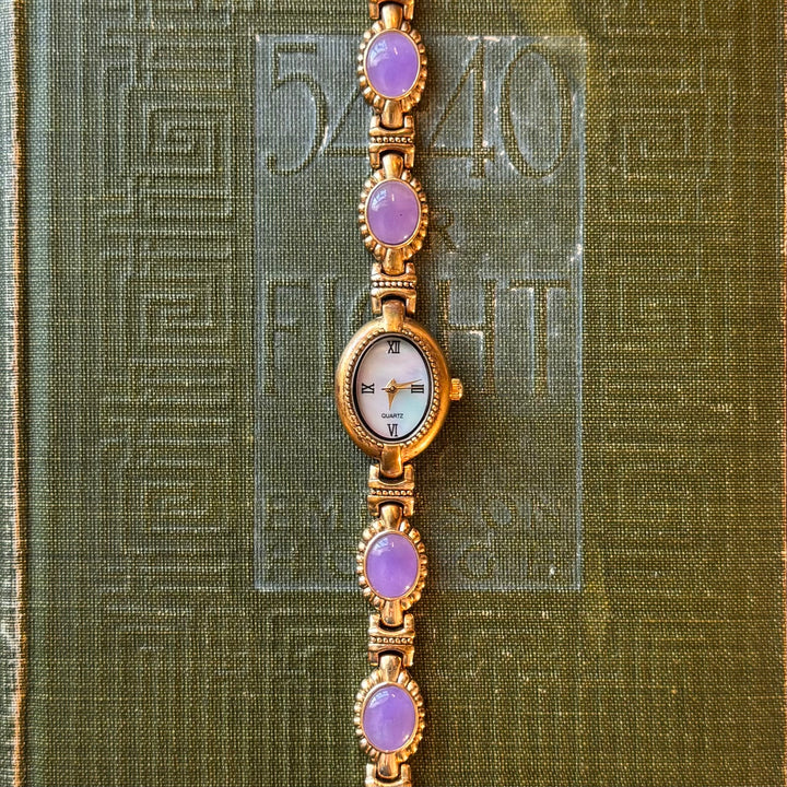Gold Watch with Purple Cabochon Stones