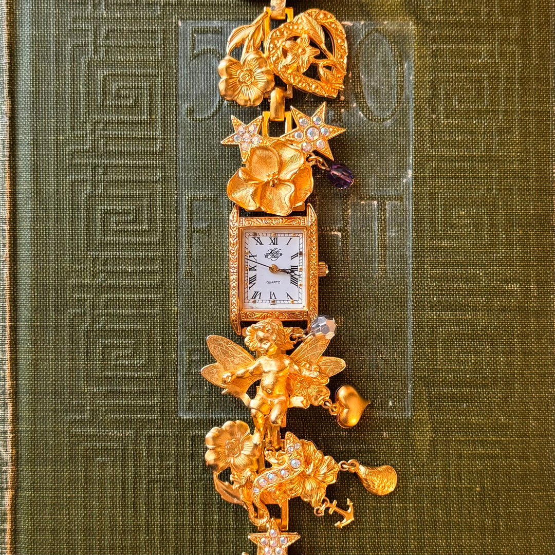 Extremely Rare Kirks Folly Cherub Charm Watch